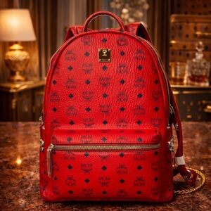 MCM Stark Side Studded Red Visatos Monogram Backpack with Leather Trim